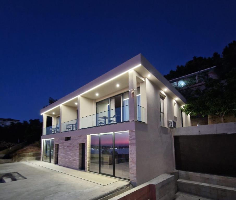 Oricon Coast luxury resort stone wall logo